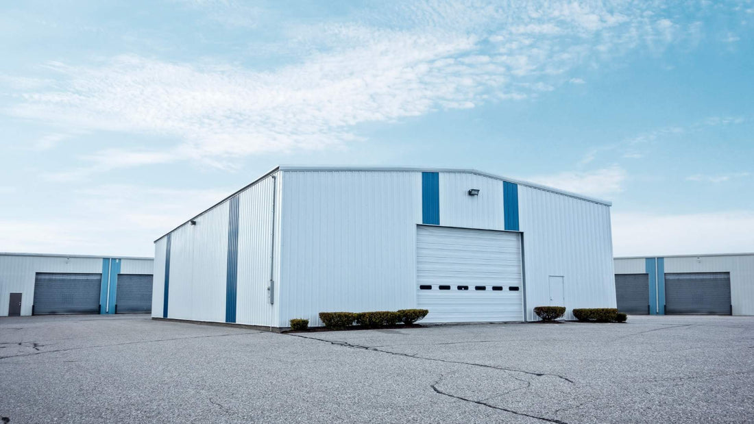 Metal Building with prefabricated sculptured gutter prone to clogging and gutter problems