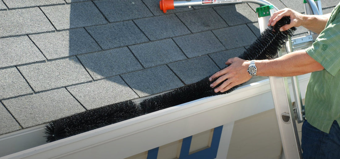 homeownser self installs gutter clog protection.