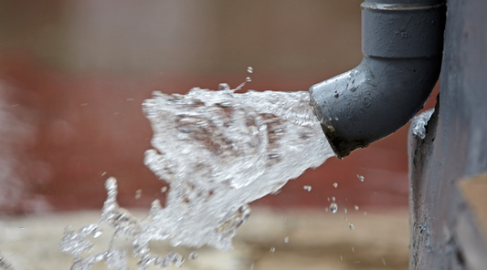 Managing Water Flow with Downspout Splash Guards