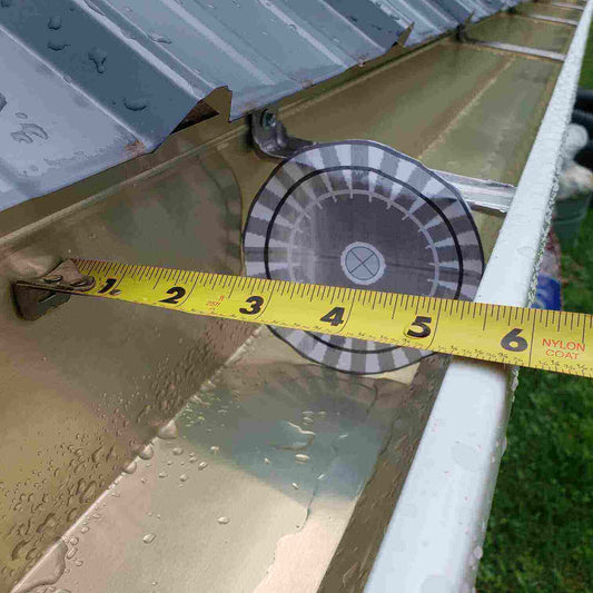 how to measure for gutter guard, shows tape measure and gutter