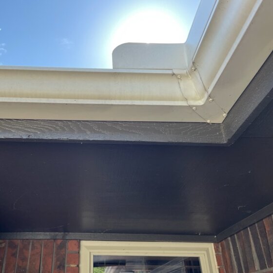 Clean gutter on sunny day not clogged